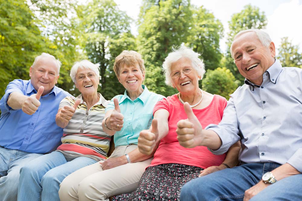 group of older people celebrating ageing healthy