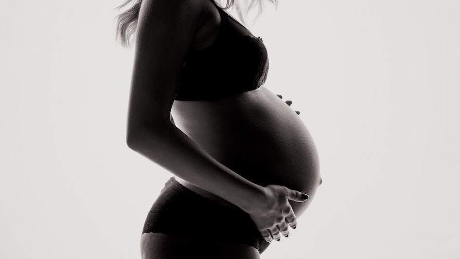 woman side profile during pregnancy