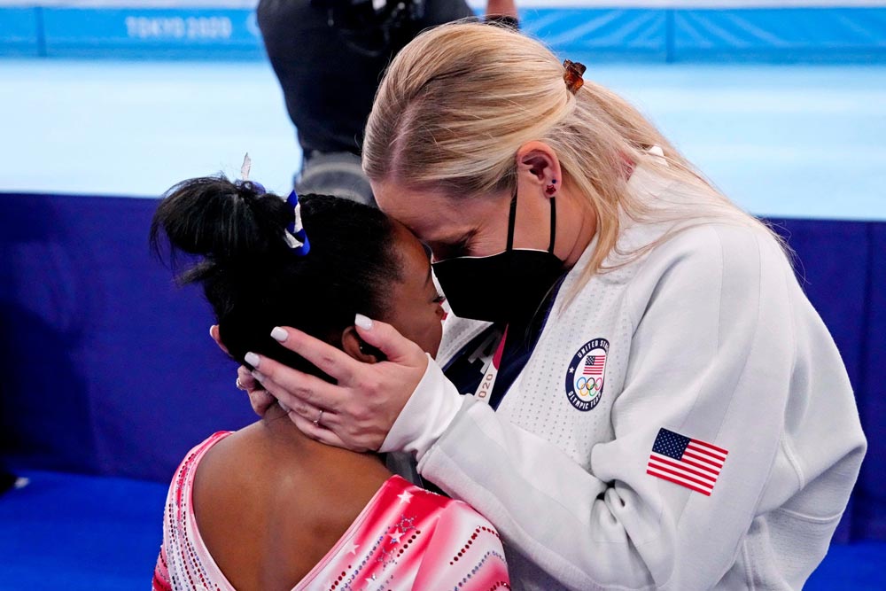 Coach Cecile Canqueteau-Landi supporting Simone Biles Olympic decision