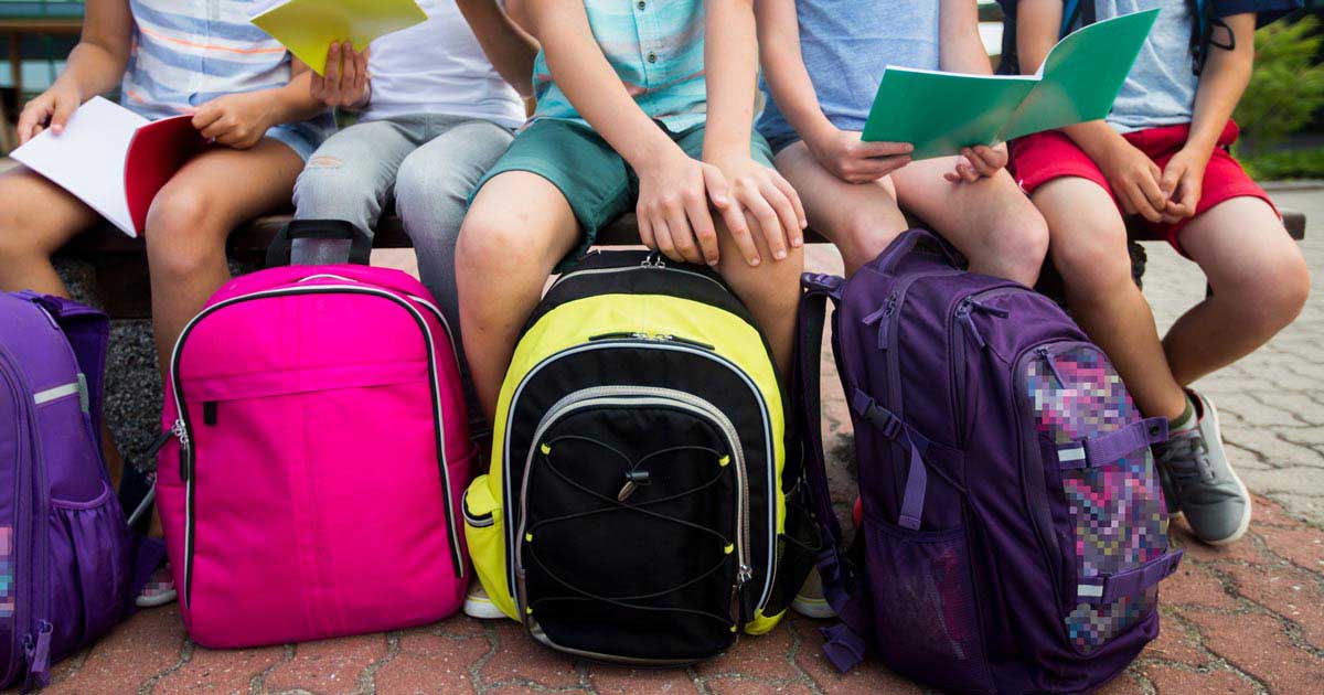 children with ergonomic school backpacks